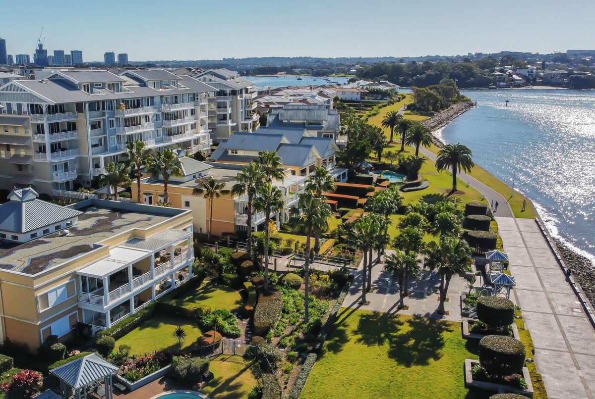 Aerial view of Breakfast Point apartments along the Parramatta River